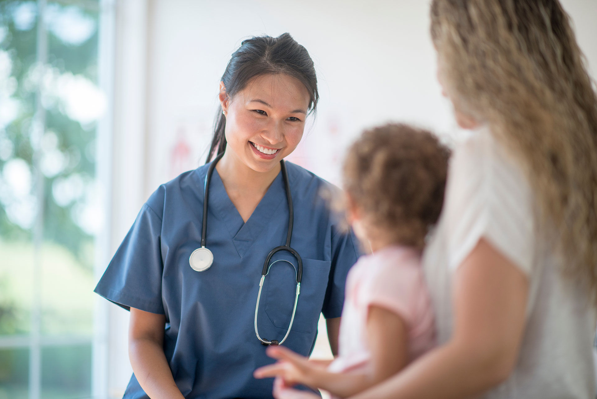 female-nurse-with-pediatric-patient